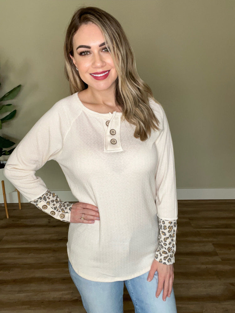 Button Front Pointelle Henley With Leopard Print Sleeves In Cream